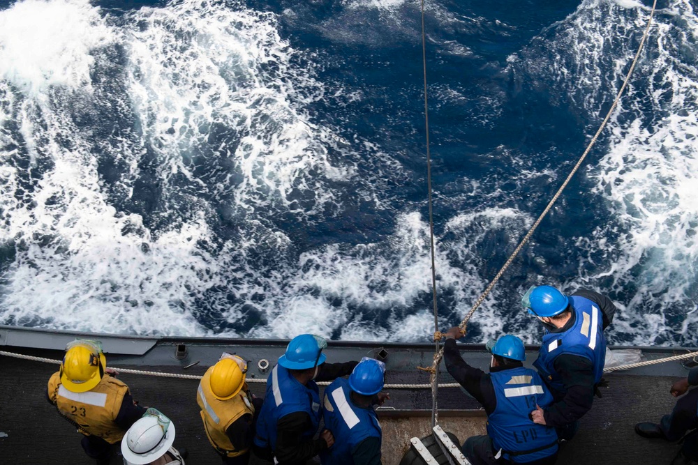 USS John P. Murtha conducts a replenishment-at-sea