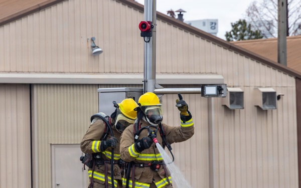 U.S. Marines execute simulated aircraft firefighting drill