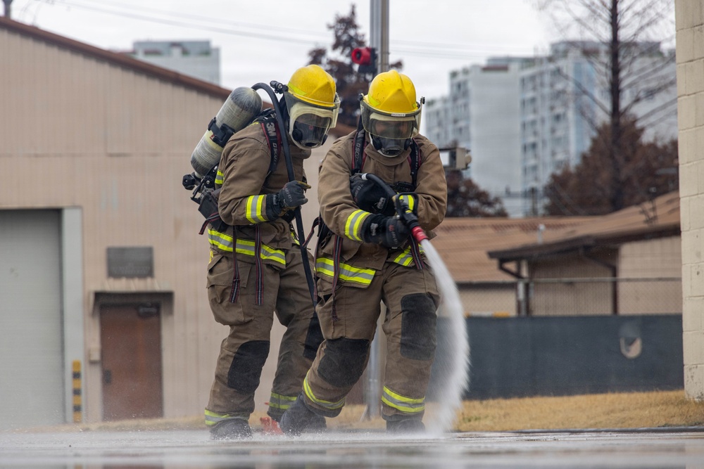 U.S. Marines execute simulated aircraft firefighting drill