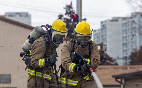 U.S. Marines execute simulated aircraft firefighting drill