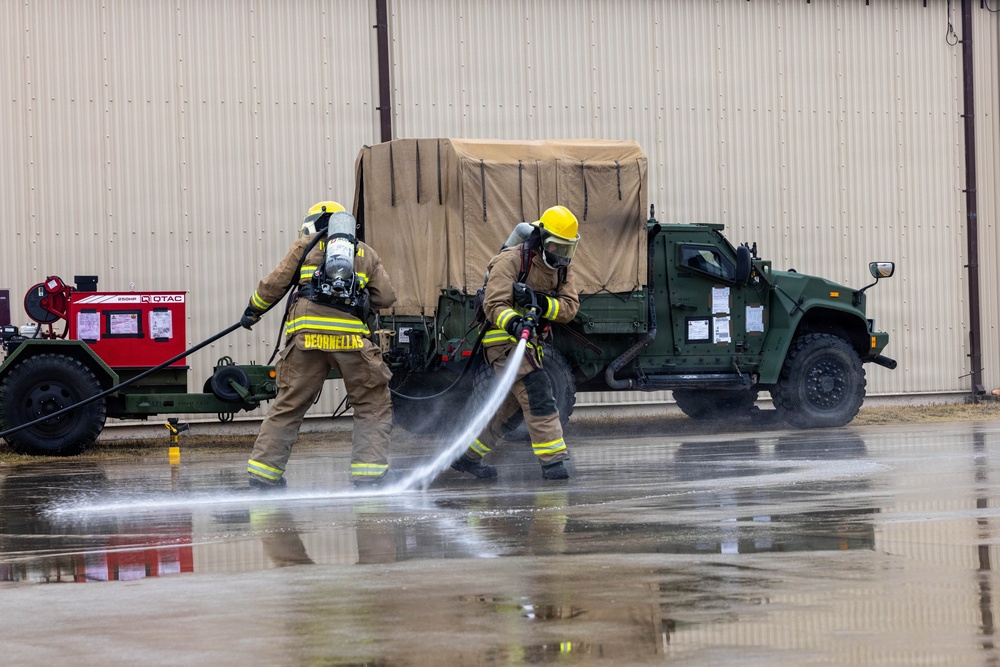 U.S. Marines execute simulated aircraft firefighting drill