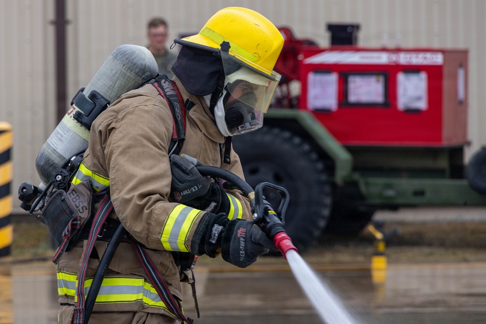 U.S. Marines execute simulated aircraft firefighting drill