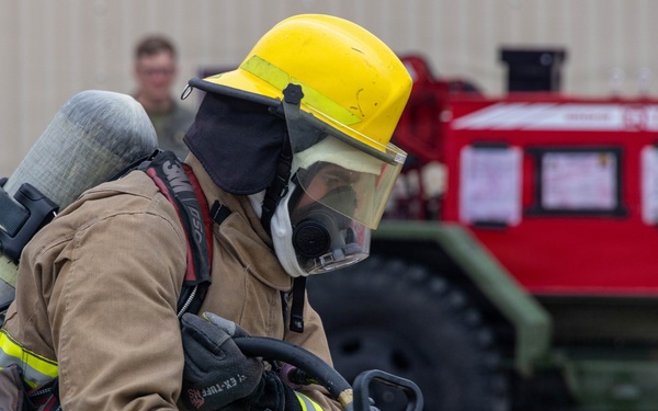 U.S. Marines execute simulated aircraft firefighting drill