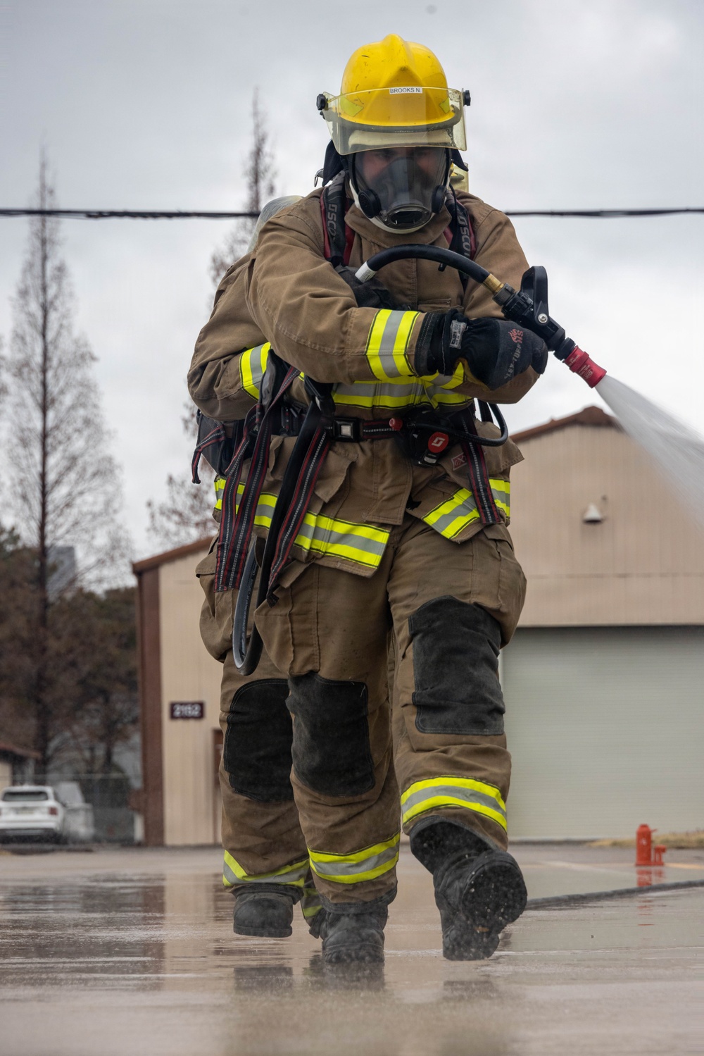 U.S. Marines execute simulated aircraft firefighting drill
