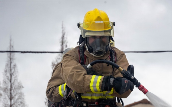 U.S. Marines execute simulated aircraft firefighting drill