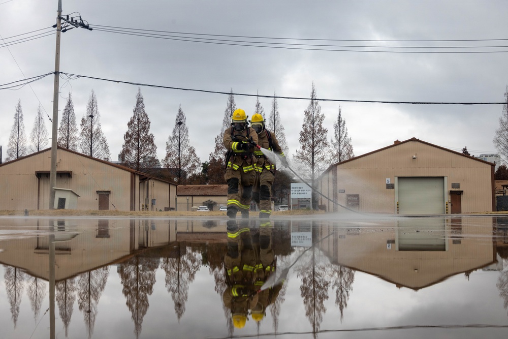 U.S. Marines execute simulated aircraft firefighting drill