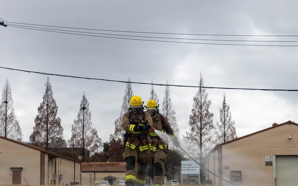 U.S. Marines execute simulated aircraft firefighting drill