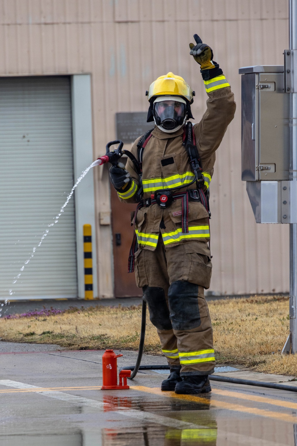 U.S. Marines execute simulated aircraft firefighting drill