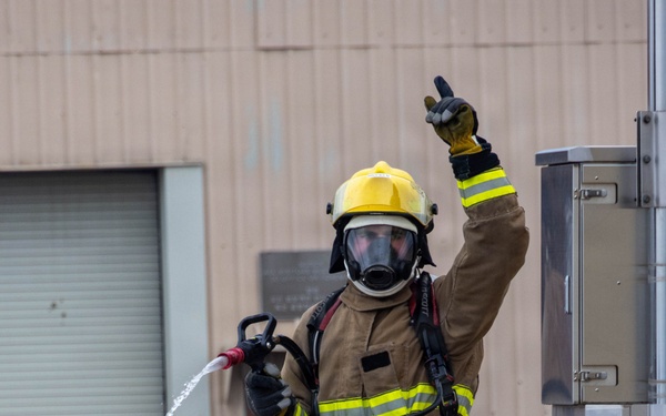 U.S. Marines execute simulated aircraft firefighting drill