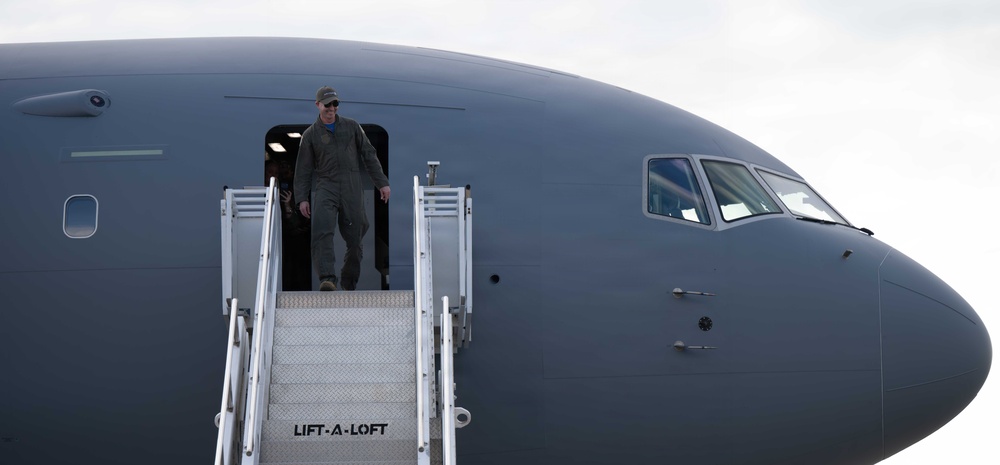 U.S. Air Force Maj. Kyle Hadel celebrates his final flight