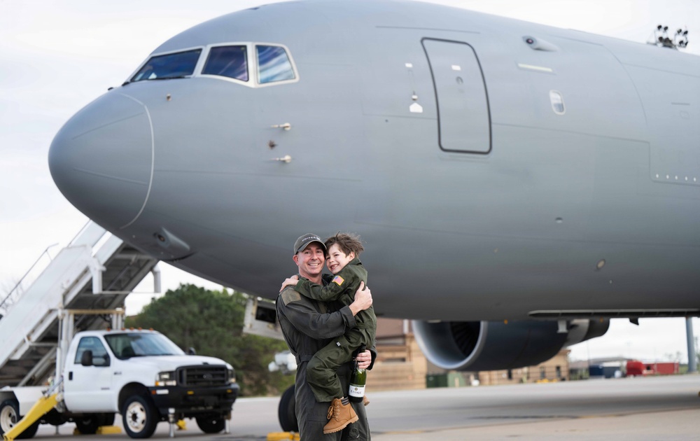 U.S. Air Force Maj. Hyle Hadel celebrates his final flight