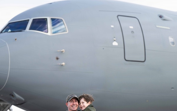U.S. Air Force Maj. Hyle Hadel celebrates his final flight