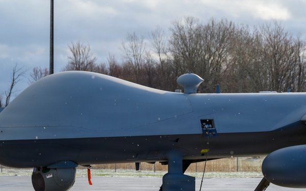 MQ-9 Reaper conducts preflight checks in winter weather