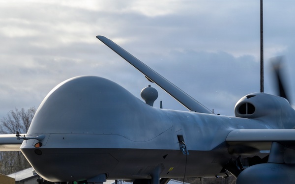 MQ-9 Reaper conducts preflight checks in winter weather