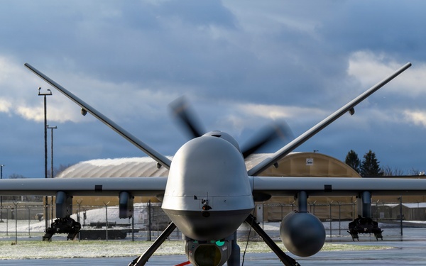 MQ-9 Reaper conducts preflight checks in winter weather