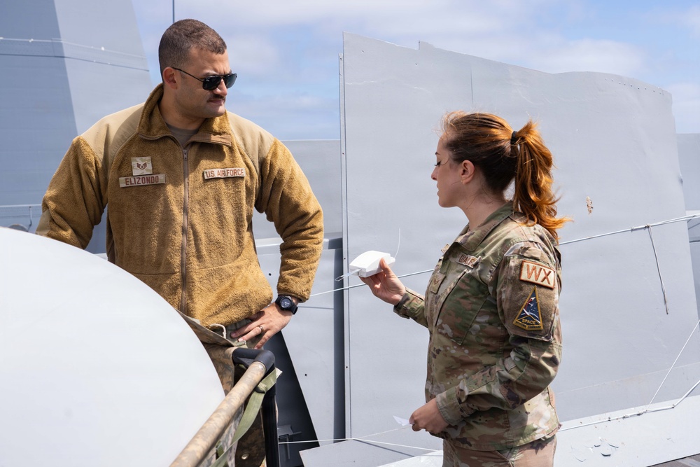 U.S. Airmen Assigned to the 45th Weather Squadron Launch Weather Balloon