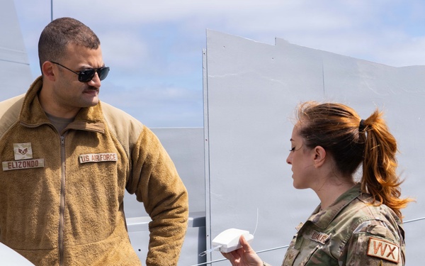 U.S. Airmen Assigned to the 45th Weather Squadron Launch Weather Balloon