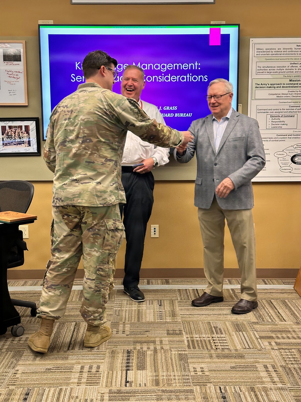 KM instructor honored for dedication, service