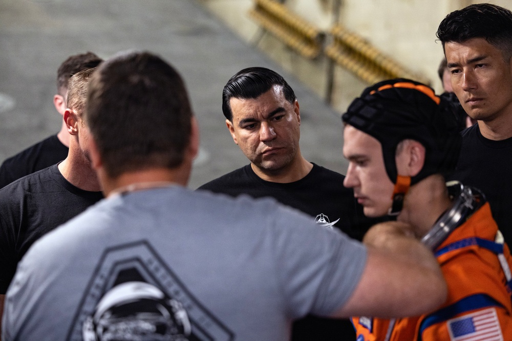 U.S. Navy medical personnel and NASA engineers prepare for Artemis II crew recovery