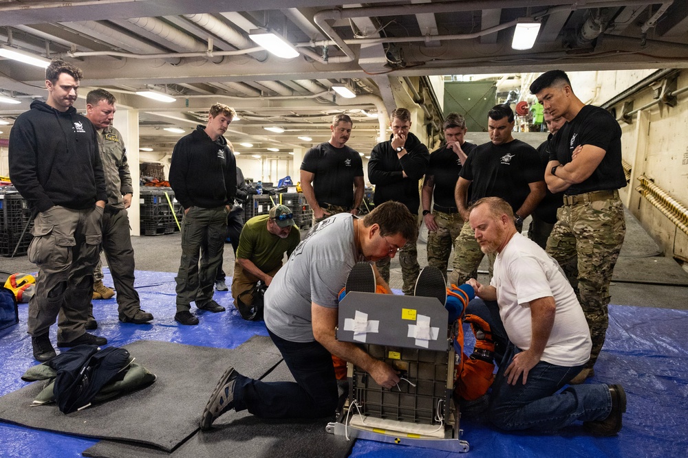 U.S. Navy medical personnel and NASA engineers prepare for Artemis II crew recovery