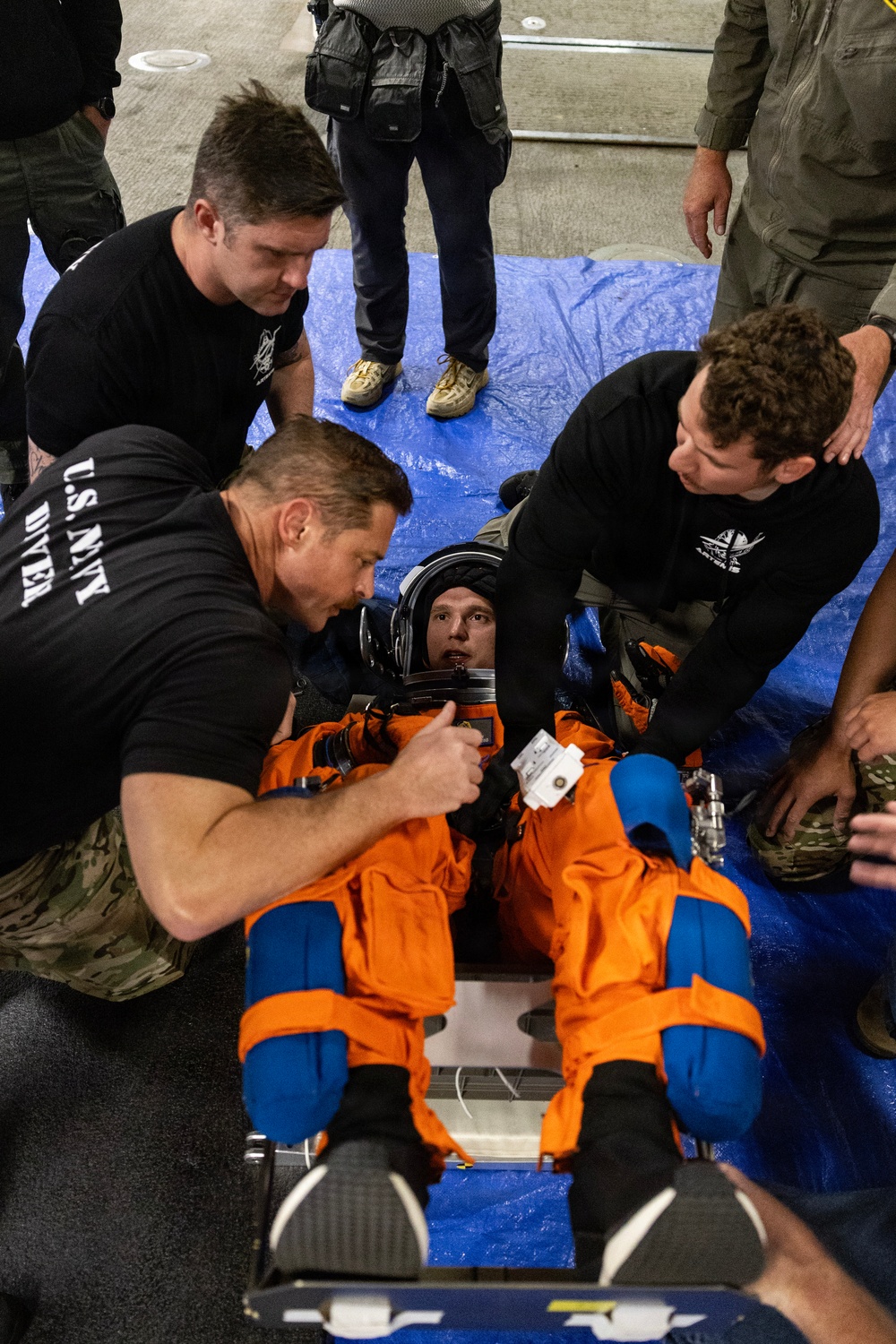 U.S. Navy medical personnel and NASA engineers prepare for Artemis II crew recovery