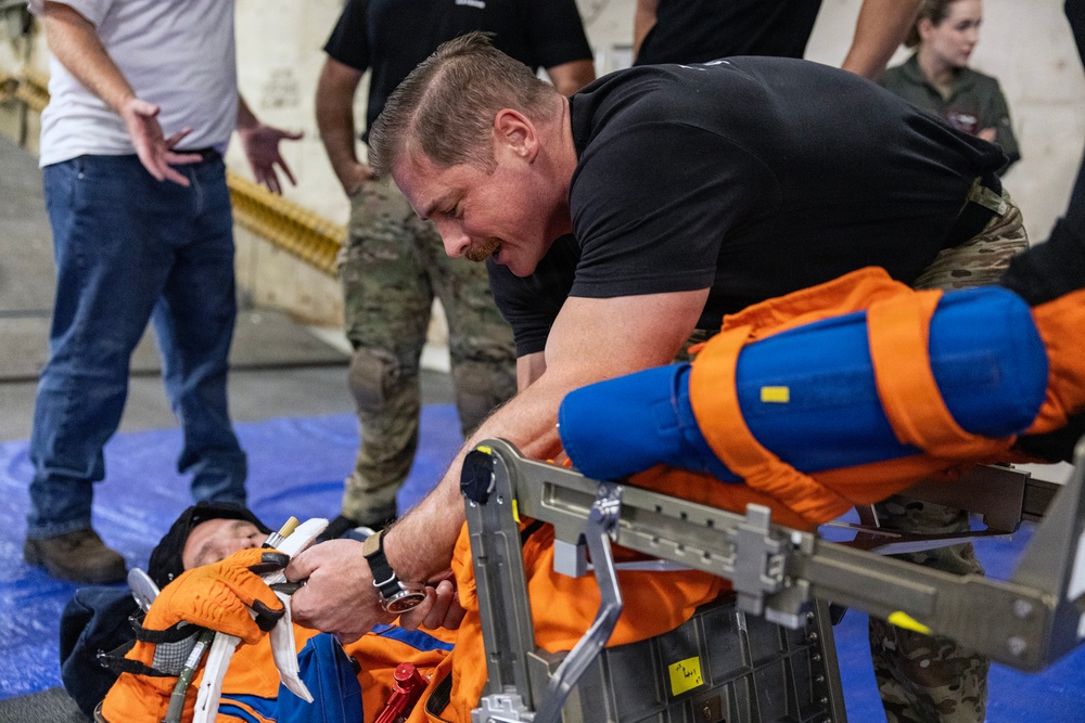 U.S. Navy medical personnel and NASA engineers prepare for Artemis II crew recovery