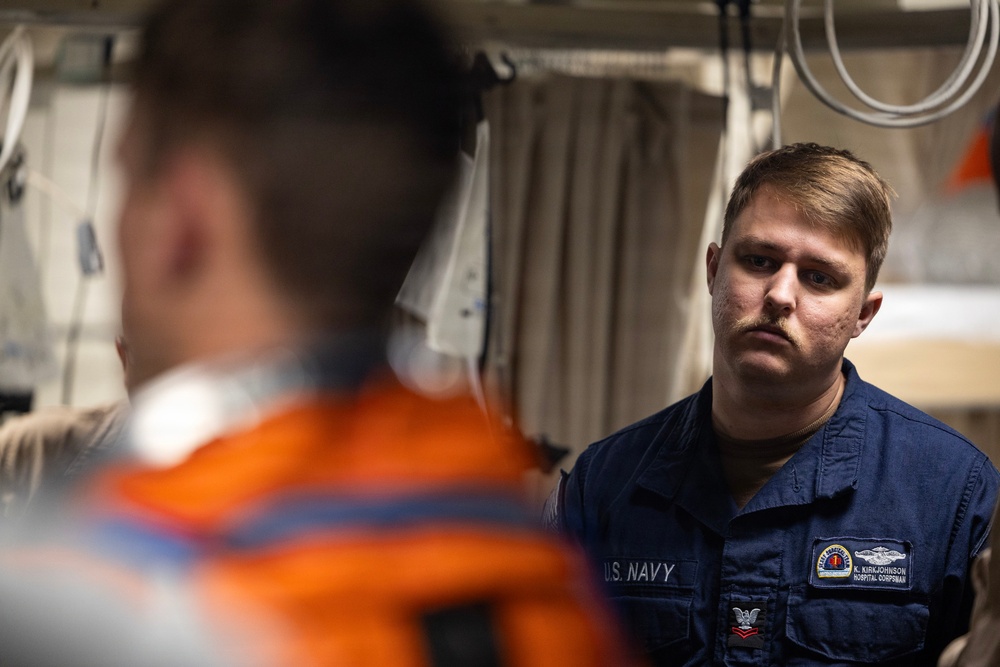 U.S. Navy medical personnel and NASA engineers prepare for Artemis II crew recovery