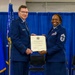 Former command chief receives retirement certificate at Hancock Field