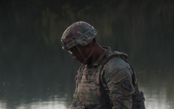 U.S. Army Spc. Jahdaniel Garcia assigned to JTF-SB, organizes ropes after aiding in the rescue of three illegal aliens attempting to cross the U.S. Southern Border.