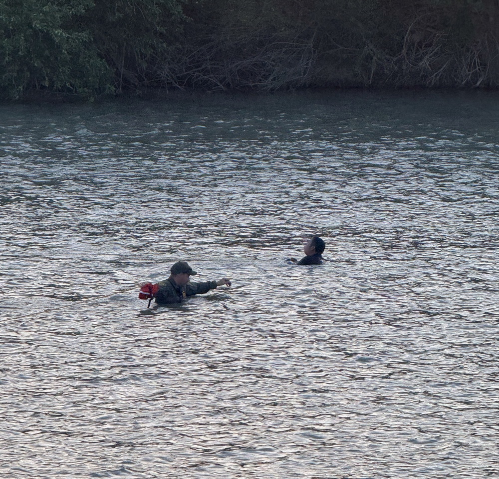 U.S. Border Patrol agents, Texas state troopers, and U.S. Army soldiers assigned to JTF-SB rescue three Illegal aliens attempting to cross the U.S southern border.