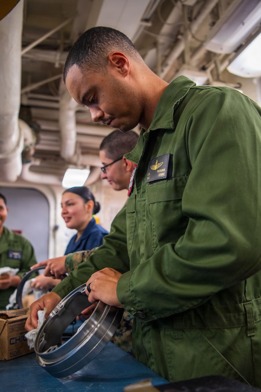 Sailors, Marines Work Together in Boxer AIMD Spaces