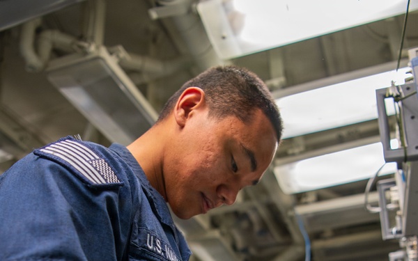 Sailors, Marines Work Together in Boxer AIMD Spaces
