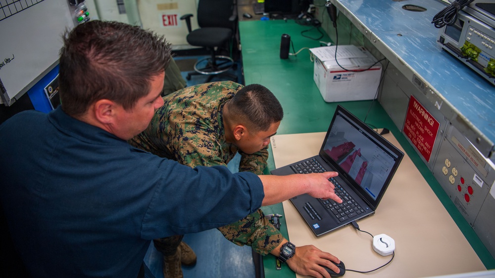 Sailors, Marines Work Together in Boxer AIMD Spaces
