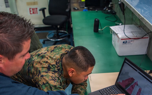 Sailors, Marines Work Together in Boxer AIMD Spaces
