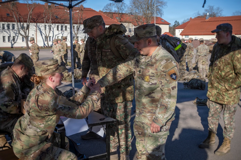 U.S. Soldiers and NATO allies participate in a Norwegian Foot March