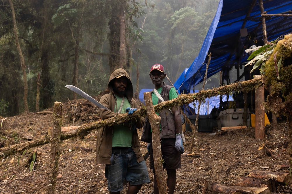DPAA Mission 25-4 local workers help with base camp maintenance in Papua New Guinea