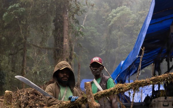 DPAA Mission 25-4 local workers help with base camp maintenance in Papua New Guinea