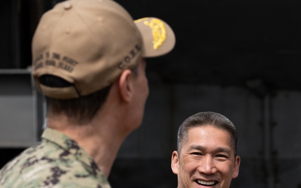 Under SECNAV Visits IKE