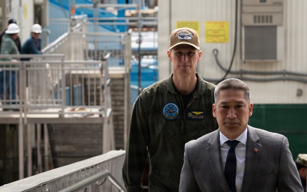 Under SECNAV Visits IKE