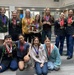 Fort Knox High School academic decathlon team members pose with their medals and trophy