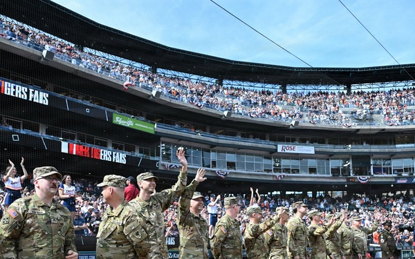 Michigan National Guard Soldiers participate in the Detroit Tigers Opening Dey Ceremony.