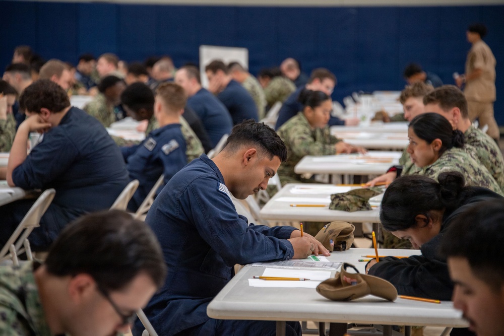 USS Carl Vinson (CVN 70) Sailors take the Advancement Exam