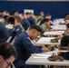 USS Carl Vinson (CVN 70) Sailors take the Advancement Exam