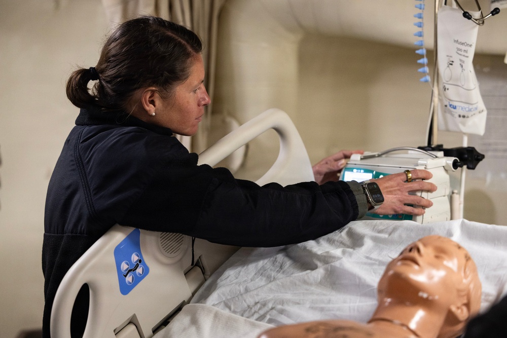 Sailors from USS John P. Murtha, Fleet Surgical Teams 1 and 9, Naval Medical Center San Diego conduct medical drill ahead of Artemis II recovery operations