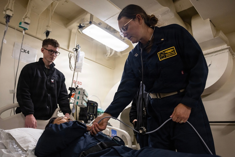 Sailors from USS John P. Murtha, Fleet Surgical Teams 1 and 9, Naval Medical Center San Diego conduct medical drill ahead of Artemis II recovery operations