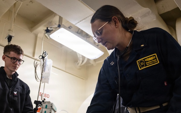 Sailors from USS John P. Murtha, Fleet Surgical Teams 1 and 9, Naval Medical Center San Diego conduct medical drill ahead of Artemis II recovery operations
