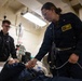 Sailors from USS John P. Murtha, Fleet Surgical Teams 1 and 9, Naval Medical Center San Diego conduct medical drill ahead of Artemis II recovery operations