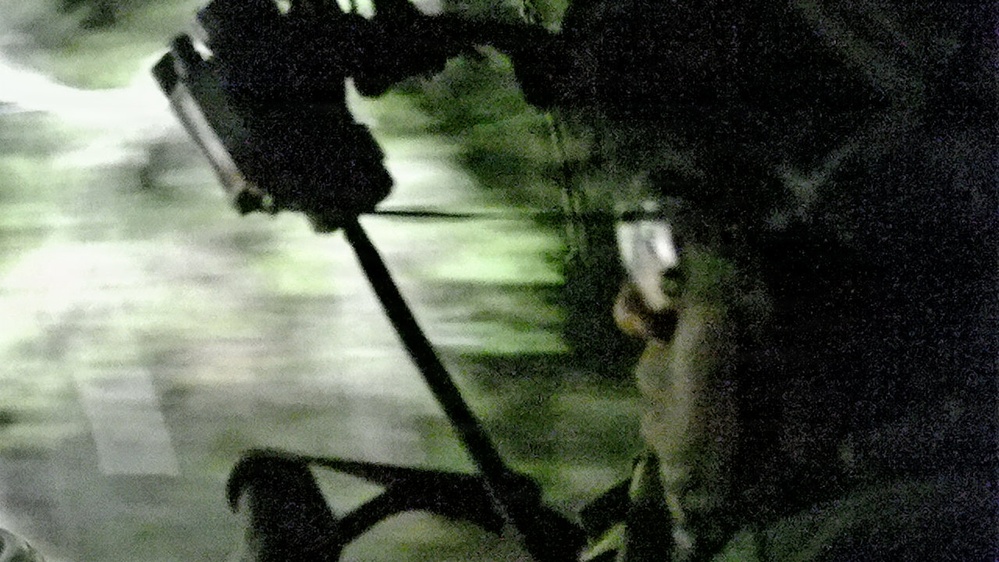 101st MFRC Soldier rides an ISV into combat simulation scenario at JRTC