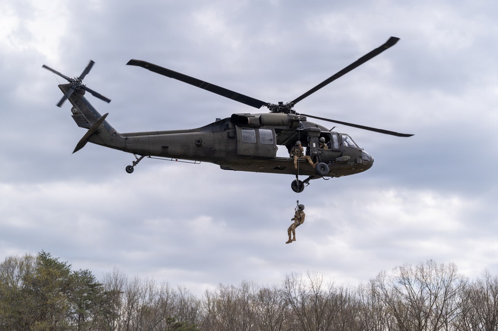 Maryland Guard helicopters and police K-9 units collaborate during MEDEVAC training