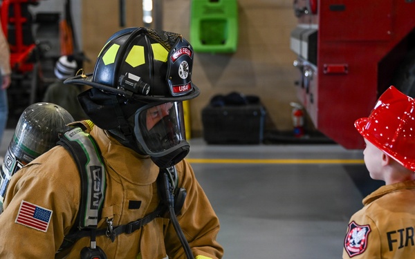 1 SOW firefighters teach military kids fire safety